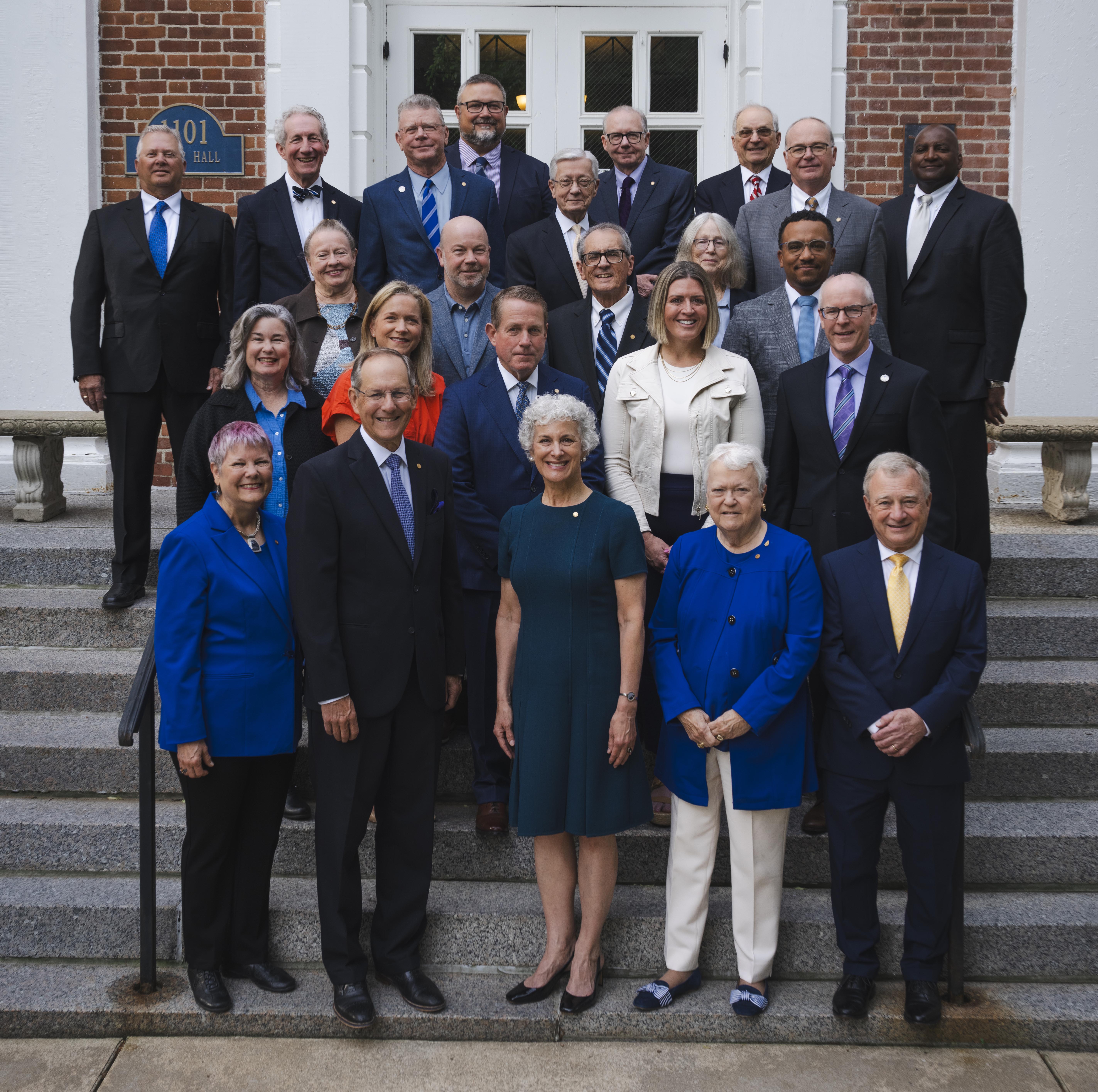 Photo caption: Front (L-R):  Toni Blankmann ’74, Chair Steven R Mills ’77, President Barbara Farley, Joy French Becker ’67 H’05, Patrick B. Mathis Second row (L-R): Dr. Susan L. Pratt ’80, Joan M. Deboer, Greg C. May ’88, Joanna Marker ’02, James W. Spradlin ’82 Third row (L-R): Susan J. Allen, Michael A. Fletcher ’92, Henry A. Schmitt ’73, Ellen Rammelkamp Miller ’72, Joseph T. Calemese ’07 Back row (L-R): Gerry Beard ’78, Robert E. Chipman ’74 H’23 *, Del Dunham ’72, Dr. Scott Boston, Dr. John Kay, Dr. Gary Haynes ’74, Dr. James L. Green ’61 H’11, Michael Bauersachs ’86, Winston Rogers, III ’82