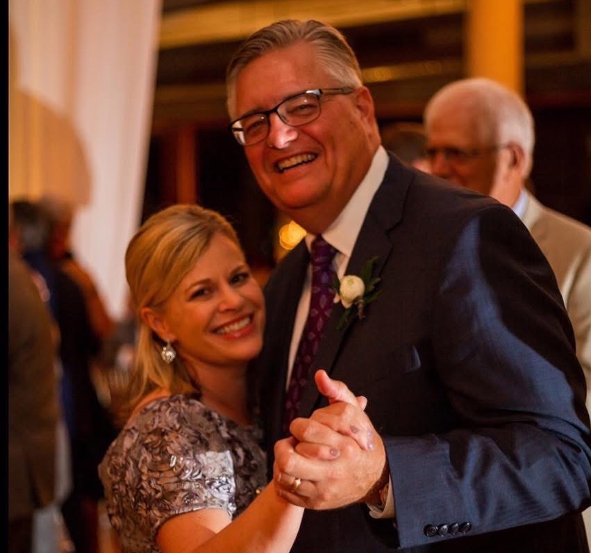 Mark A. Kluemke ’88 dancing with his wife Amy