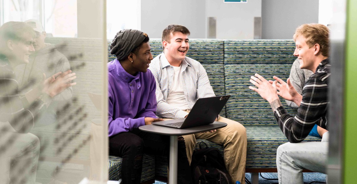 Students talking and smiling