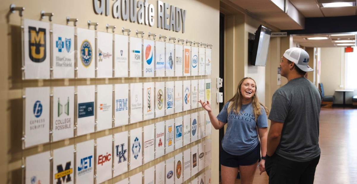Students looking at Graduate READY wall