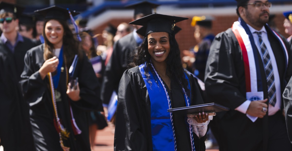 Student celebrating at commencement