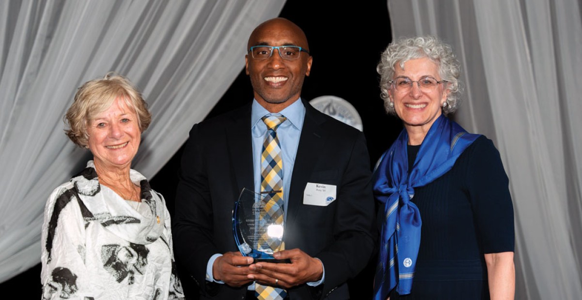 Alumni Association board President Marcy Bramley Burrus ’71, Distinguished Service Award recipient Kevin Petty ’89 and Illinois College President Barbara A. Farley pose for a photo during the Illinois College Society Gala in May.