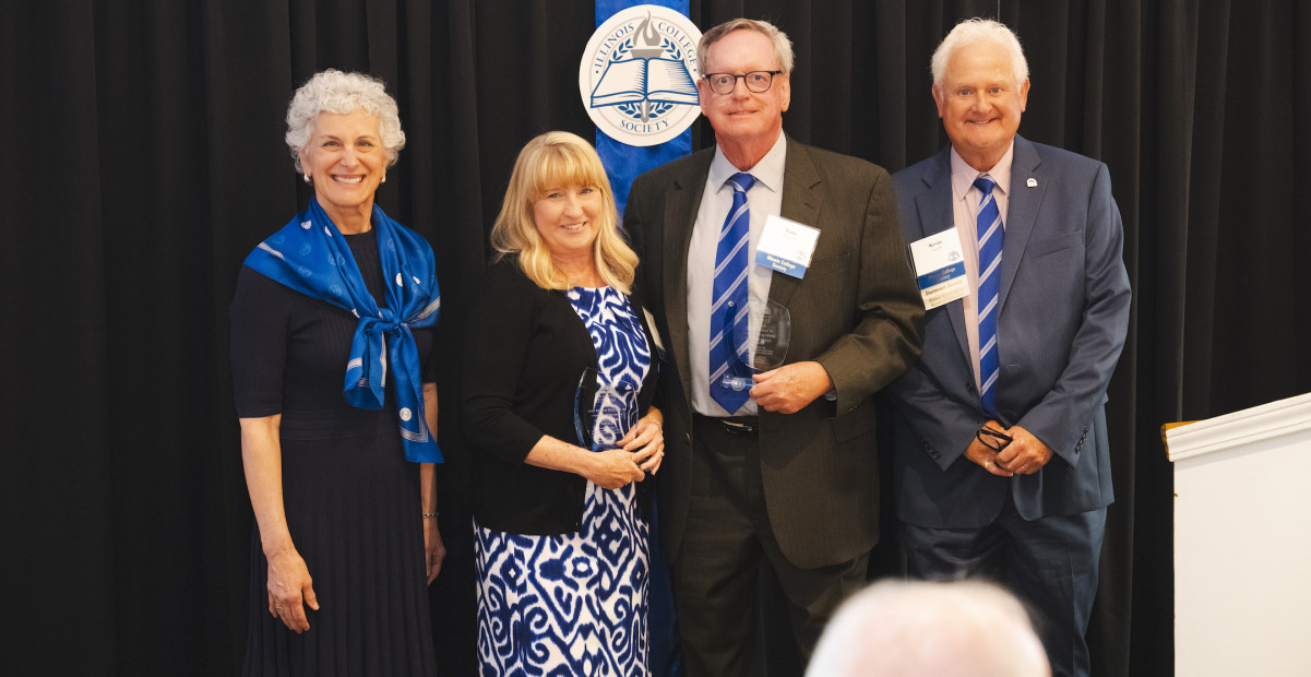 Tom and Ann Bishop Prather '80 accepting award at Society Gala