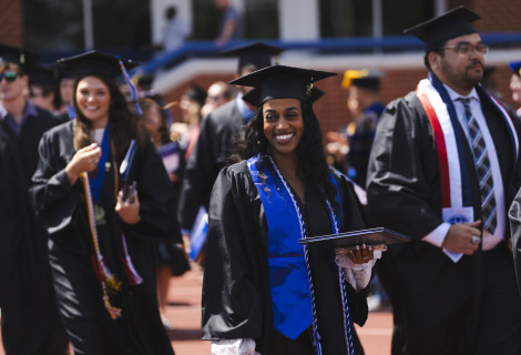 Students celebrating at graduation