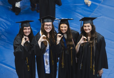 IC students posing at graduation