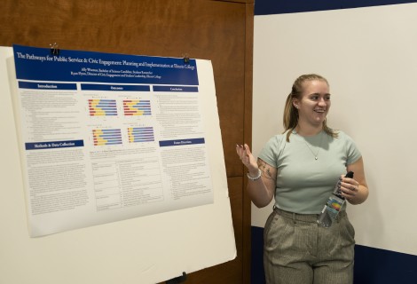 Ally Wiseman '24 presenting research at a student-faculty research showcase on campus