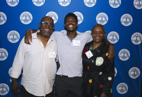 Josh pictured with his father, William, and mother, Jacqueline