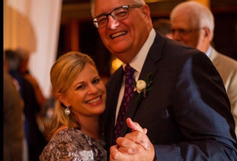 Mark A. Kluemke ’88 dancing with his wife Amy