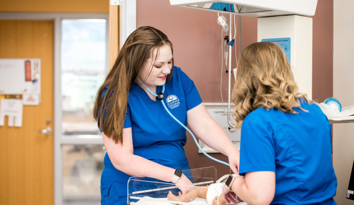 Nursing students practicing skills 