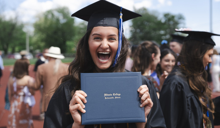 Student celebrating at commencement