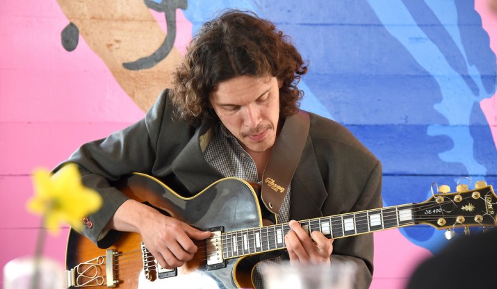 Jose Gobbo playing guitar